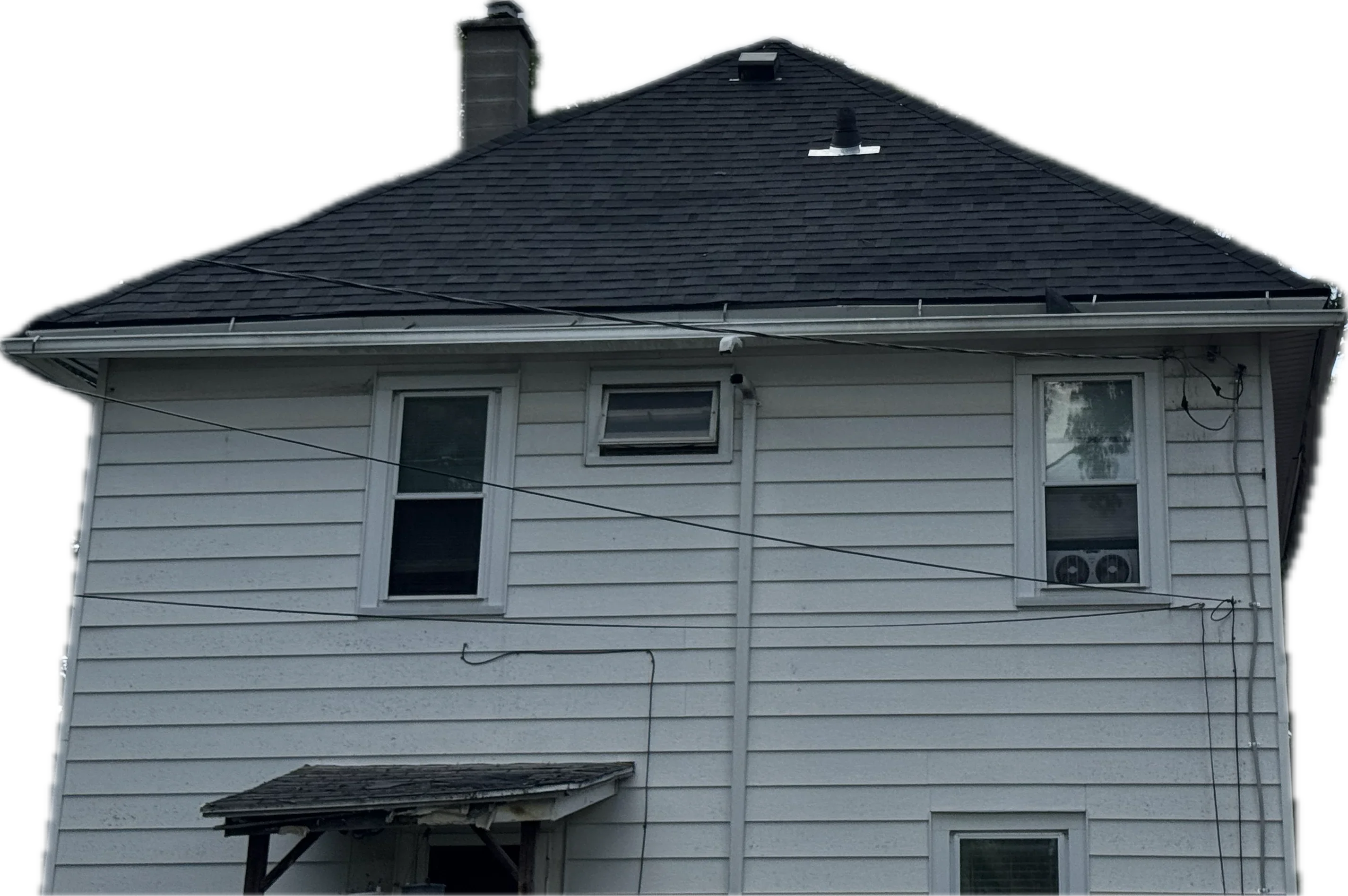 New black architectural shingle roof with gutters and chimney flashing on two-story home